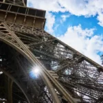 the wrought-iron lattice structure of the Eiffel Tower in Paris