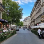 a classic Parisian brasserie featuring outdoor seating