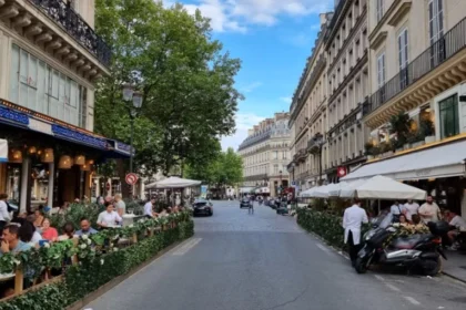 a classic Parisian brasserie featuring outdoor seating